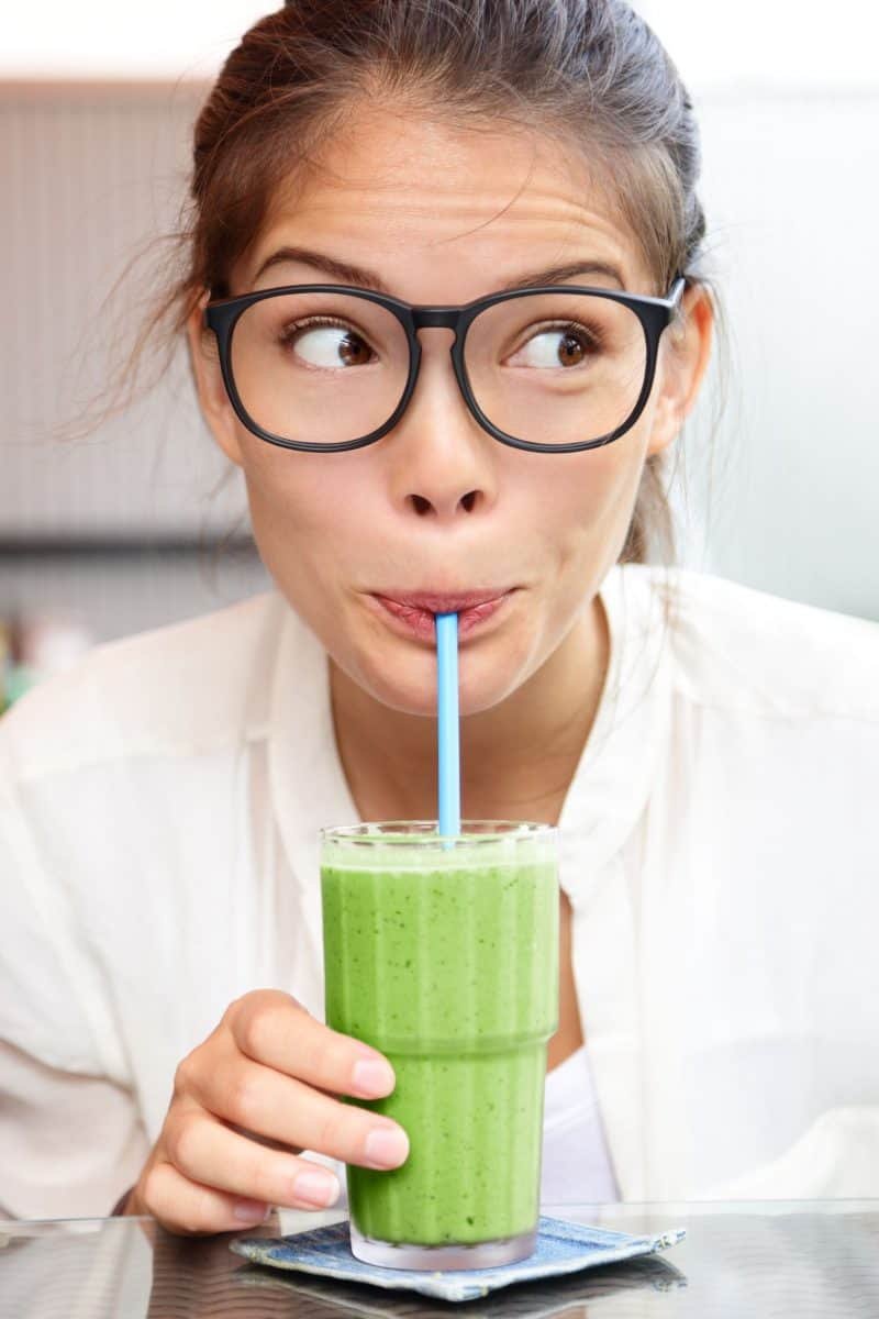 woman drinking health shake