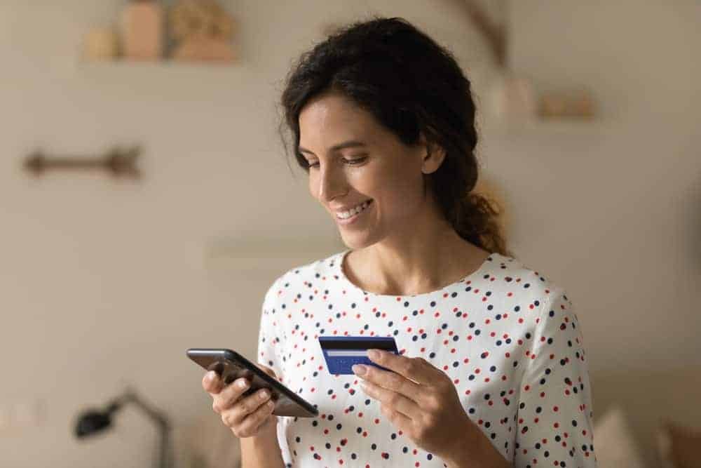 Woman applying for an online loan from her smartphone