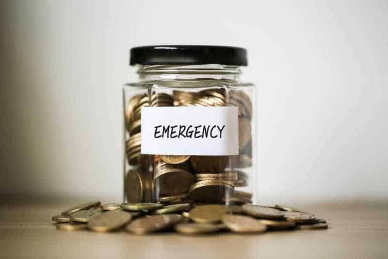 Jar of coins marked for emergency